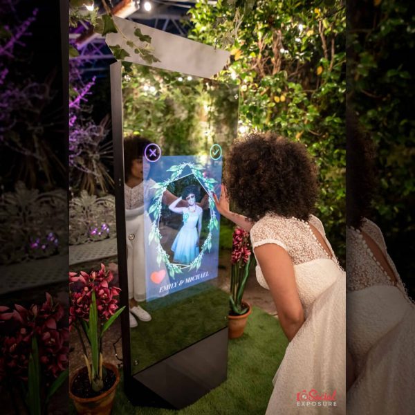 bride looking at her photo on a screen selecting to print it